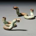 Pair of Jonathan Bonner Snake Candlesticks