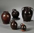 Five Dark Brown Manganese Glazed Ovoid Jars and Jugs