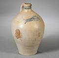 Stoneware Jug with Incised Fish Decoration