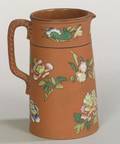 Wedgwood Rosso Antico Enamel Decorated Jug