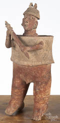 PreColumbian pottery standing warrior figure