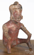 Colima preColumbian pottery vessel in the form of a seated man with his hands on his knees