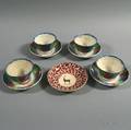 Nine Spatterware Cups and Saucers