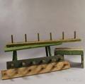 Three Paintdecorated Peg Racks and Two Stools