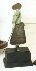 Polychromed sheet metal figure ca 1920