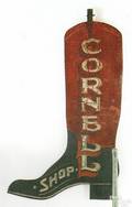 Polychrome sheet iron bootform trade sign late 19th c