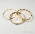 Three 18kt Gold Bangles