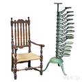 Victorian Greenpainted Cast Iron Adjustable Thirteenarm Plant Stand and a Banisterback Armchair