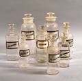 Eight Colorless Glass Apothecary Jars