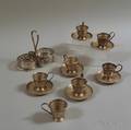 Group of Small Silver Frames and Saucers