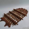 Carved and Stained Spoon Rack and Spoons