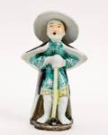 Chinese Porcelain Figure of a Figure with Hat