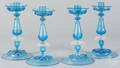 Four Venetian glass candlesticks