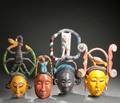 Four Ibibio Polychrome Carved Wood Face Masks