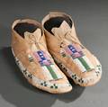 Pair of Crow Beaded Hide Mans Moccasins