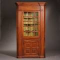 Carved and Glazed Pine Barrelback Corner Cupboard