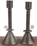Pair of tin candlesticks
