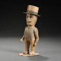 Carved and Painted Wood and Gesso Figure of a Man Wearing a Top Hat