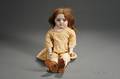 Carved Wooden and Cloth Doll