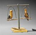 Pair of Yellowpainted Perched Bird Figures