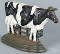 Painted cast iron cow doorstop
