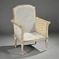 Louis XVIstyle Painted Beechwood and Caned Bergere