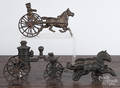 Cast iron horse drawn fire pumper