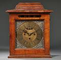 Continental Walnut Veneered Quarterchiming Table Clock