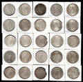 Twentyfive silver Peace dollars