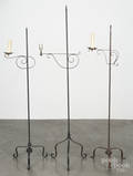 Three contemporary iron bridge floor lamps