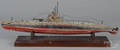 Painted white metal model of a USS S4 submarine