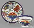 Gaudy Dutch porcelain butterfly cup and saucer 19th c