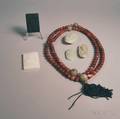 Group of Mostly Jade Carved Pendants and a Hardstone Bead Necklace