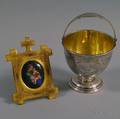 A Romrill amp Co Engraved Handled Silverplate Basket and Porcelain Miniature in Brass Frame