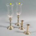 Two Pairs of Weighted Sterling Silver Candlesticks