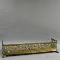 Pierced Brass Fire Fender with Paw Feet