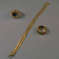 Three Gold Jewelry Items