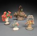 Three Painted Floral and a Fruit Basket Cast Iron Doorstops