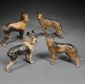 Four Painted Cast Iron Dog Door Stops