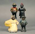 Four Painted Black Figural Still Banks
