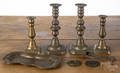 Two pairs of brass candlesticks