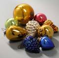 Nine Blown Colored Glass Kugel Ornaments