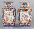 Pair of Japanese Imari palette porcelain urns 19th c