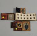 Four Cased Daguerreotypes and Ambrotypes and a Tintype Album