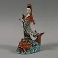 Chinese Famille Rose Porcelain Figure of Guan Yin atop a Mythical Fish
