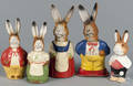 Five German pressed paper rabbit candy containers
