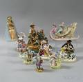 Nine Mostly Bisque Porcelain Figures