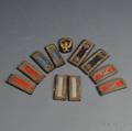 Group of American Officers Embroidered Shoulder Straps and Hat Badge