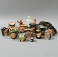 Sixteen Mostly Royal Doulton Character Jugs and Figures