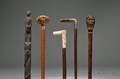 Eight Mostly Carved Walking Sticks